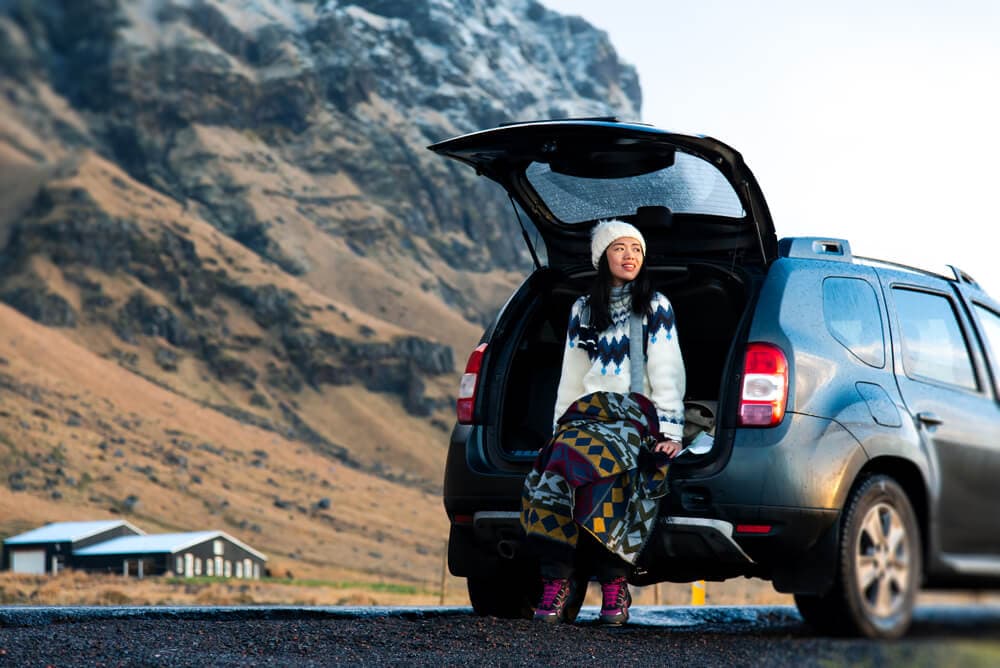 Is the Blue Car Rental app safe to use, and what safety and coverage does your rental include?