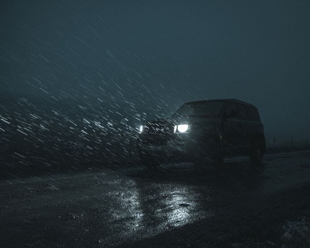 Blue Car Rental True detective night country Land Rover Defender in Iceland night country.