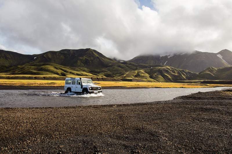 Crossing a river in Iceland Land Rover Defender crossing a river in Iceland