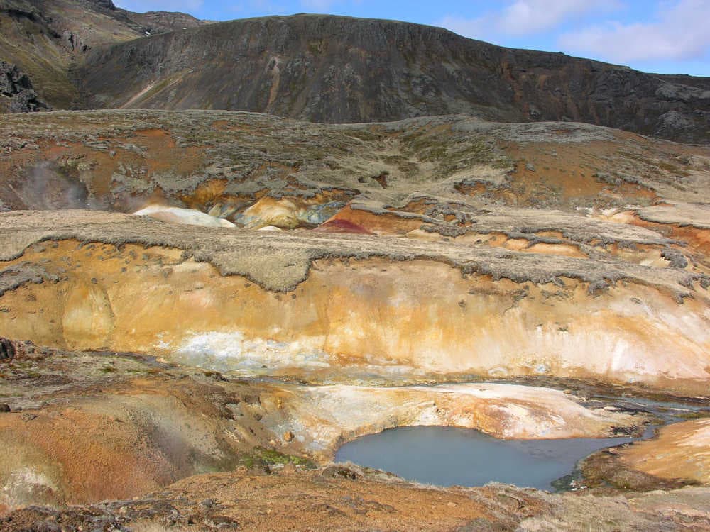 Hengill's geothermal colours. Colourful mineral deposits and pool at Hengill geothermal area