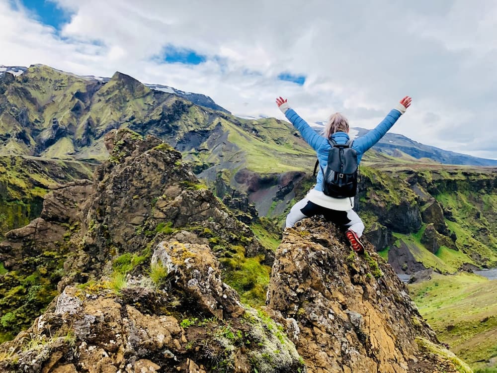 Hiking in Iceland. Sitting on a mountain top in Iceland.