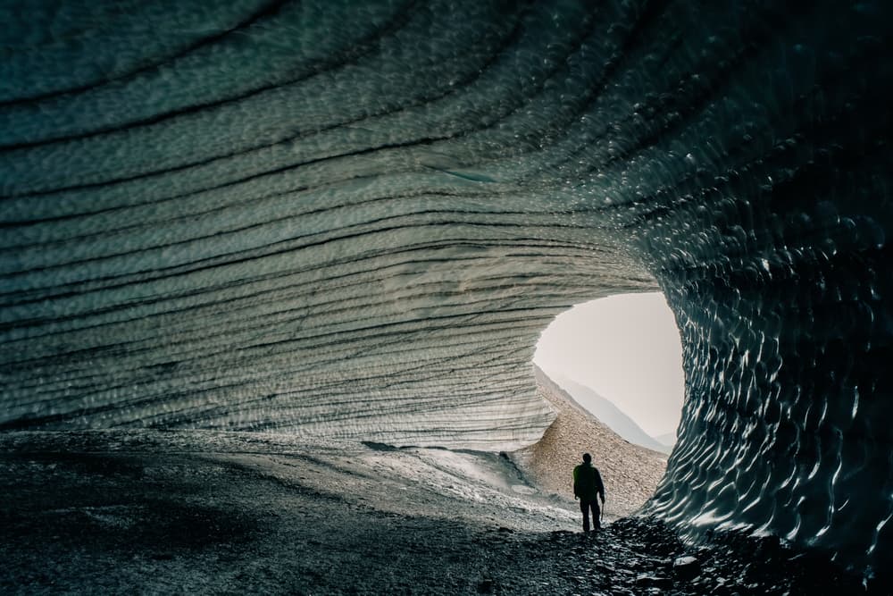 Black and dark entrance of Katla ice cave. 