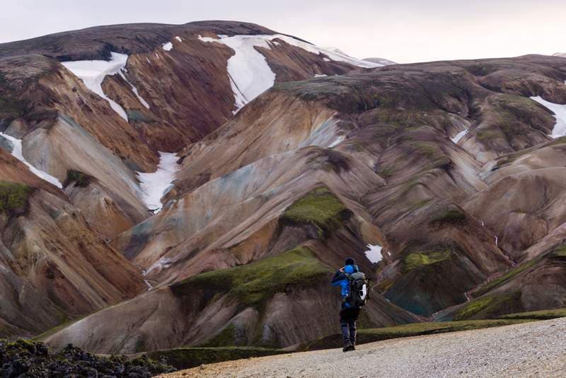 Hiker in Landmannalaugar Person hiking and watching the nature in Landmannalaugar