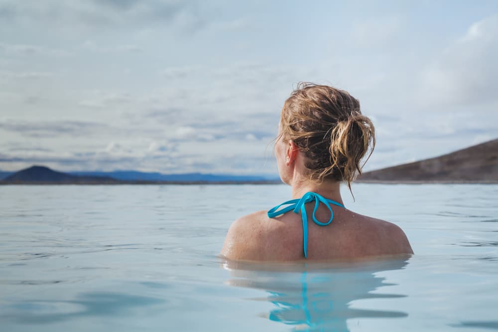 Women in The natures baths in Myvatn geothermal area.