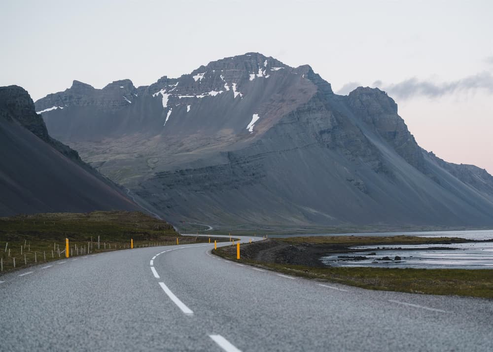 North Iceland road. Black mountains and a road in north Iceland.