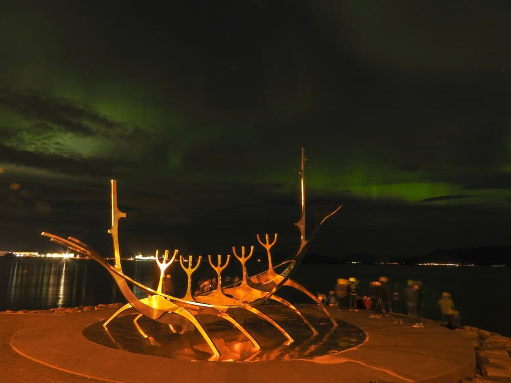 Solfar, the sun voyager under the northern lights in Reykjavik. 