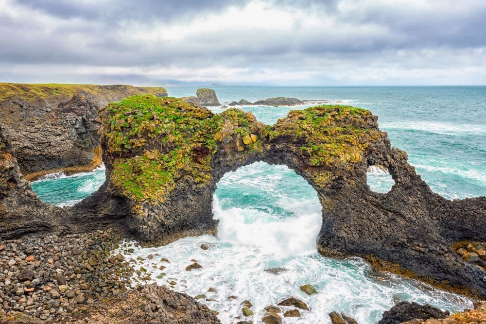 Arnarstapi rock arch in West Iceland.