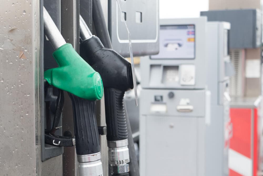 Fuel pumps in Iceland gas station. Blue Car Rental gas station pump.