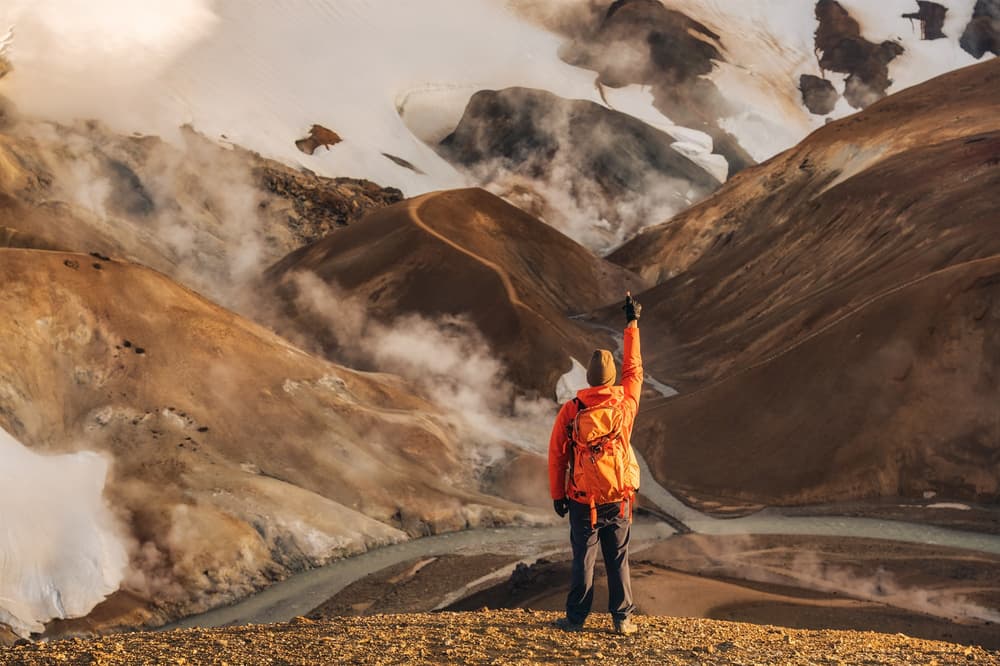 Kerlingarfjoll mountains Iceland highland. Hiker hiking at Kerlingarfjoll geohermal area in Iceland Highland.