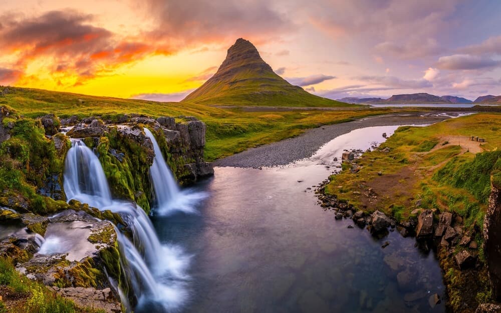 Kirkjufell midnight sun snæfellsnes Kirkjufell mountain and waterfall in the midnight sun at snæfellsnes peninsula