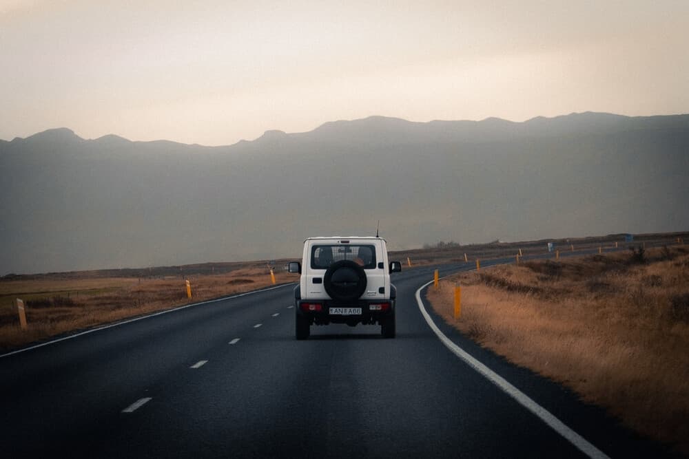Iceland open road. Suzuki Jimny 4x4 on a road in Iceland.