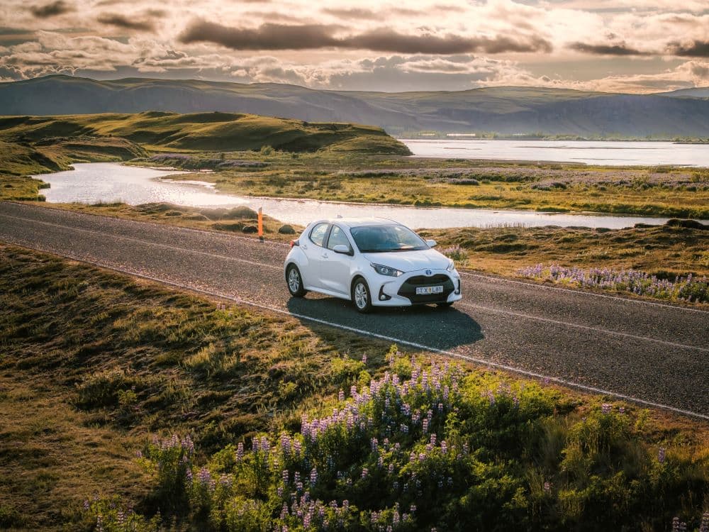 Iceland roads small car Toyota Yaris from Blue Car Rental in summer.