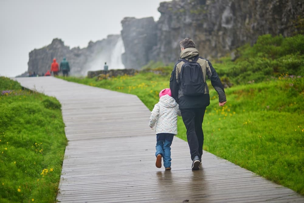 Thingvellir family. Family walking the boardwalk at Thingvellir national park.