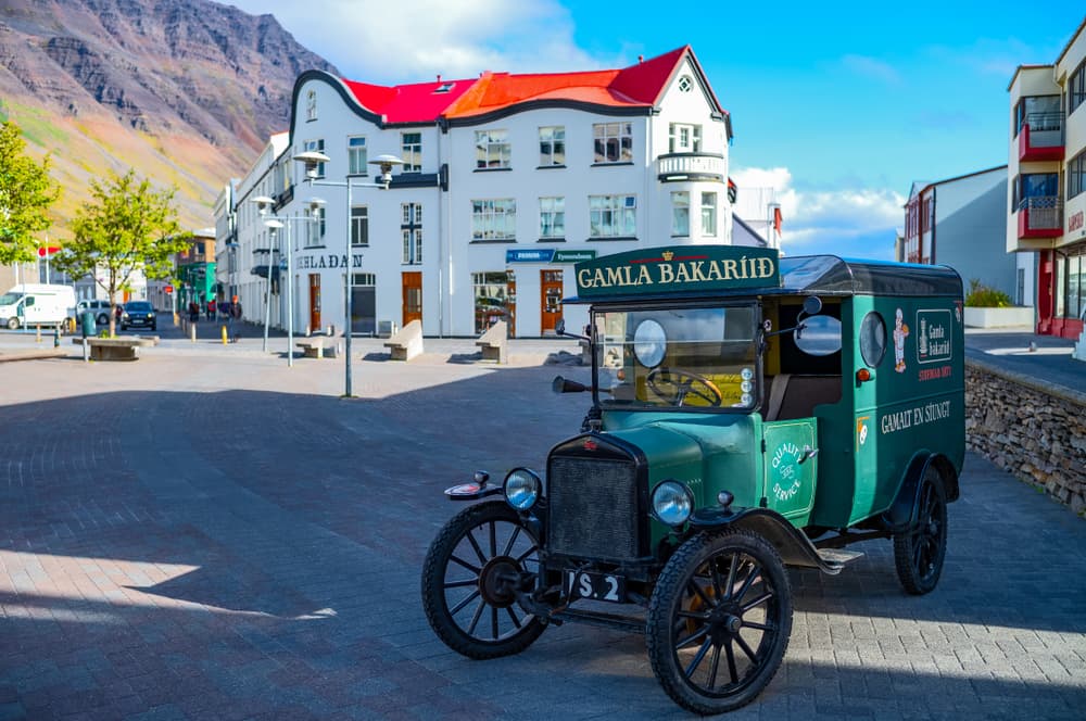 Isafjordur town. Old car in Isafjordur on a summer day in the Westfjords.