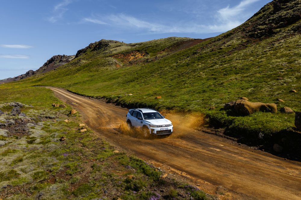 Dirt road in Iceland. Dacia Duster 4x4 driving on a dirt road in Iceland.