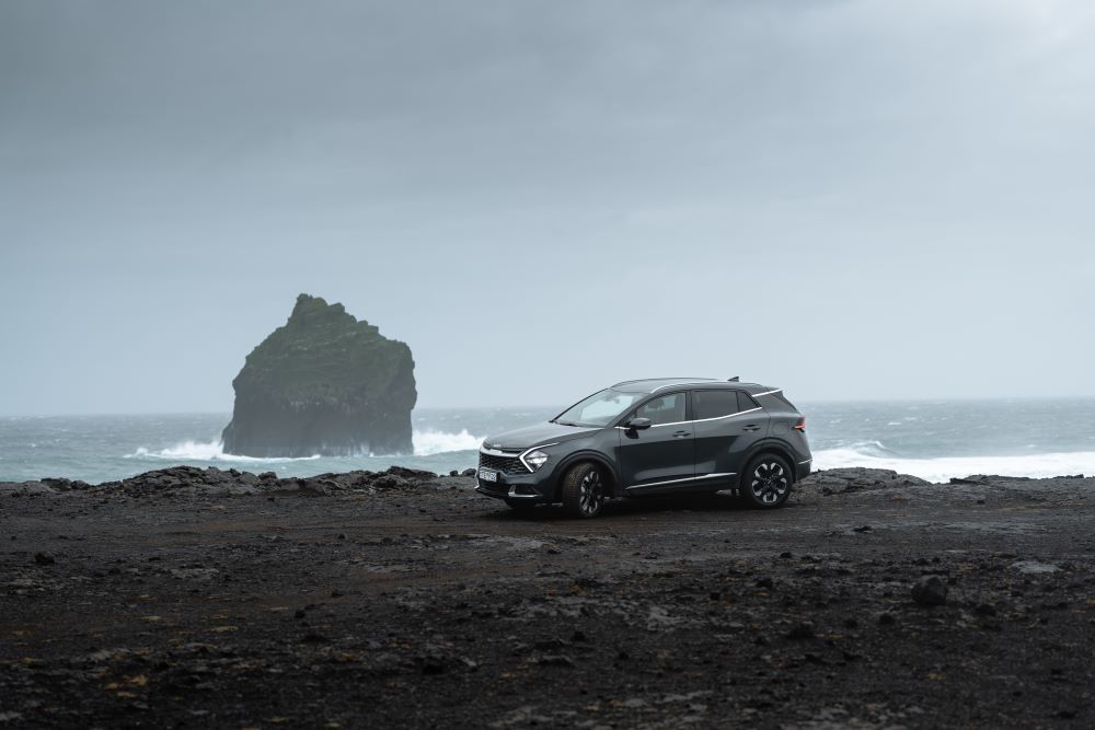 Rental car in iceland at sea cliff shore. 