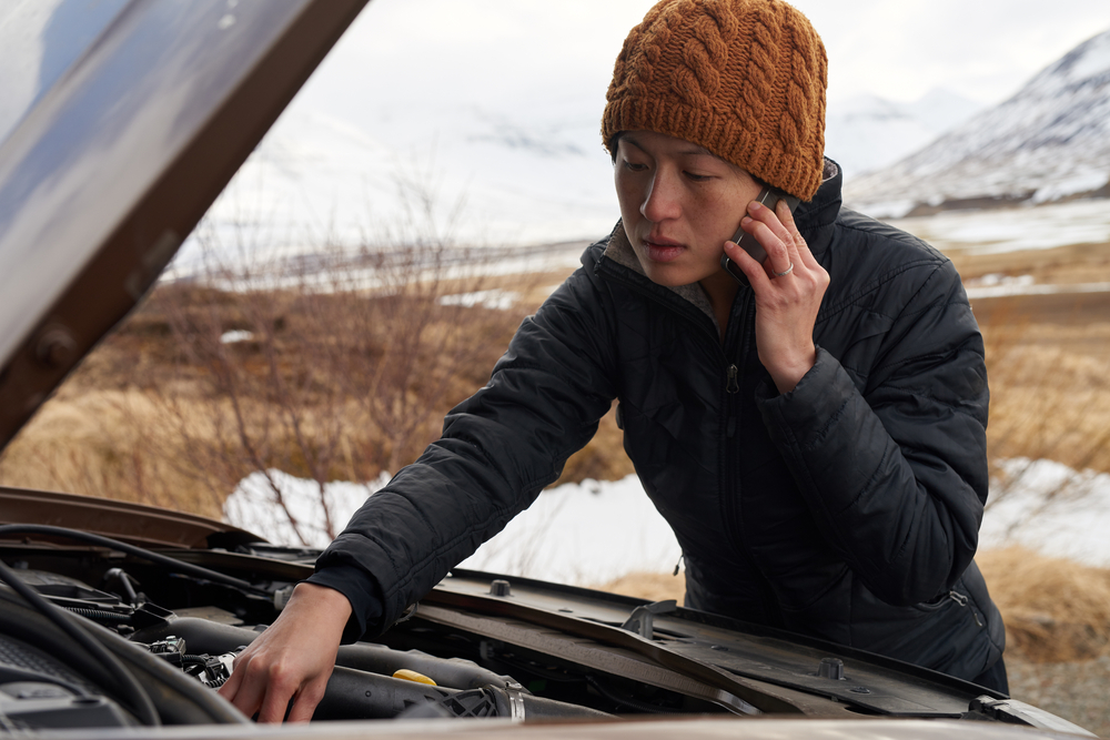 Women calling for assistance when her rental car broke down.