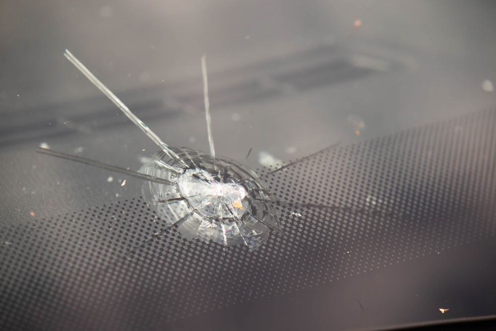 Most common gravel damge. Cracked windshield after a gravel hit