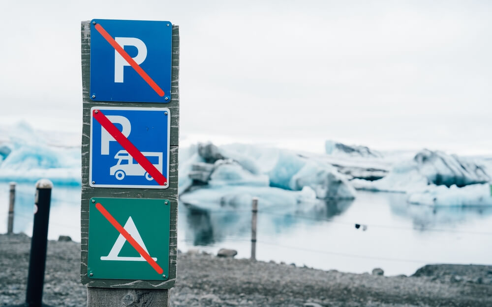 On camping sign at Jökulsárlón, glacier lagoon in Iceland.
