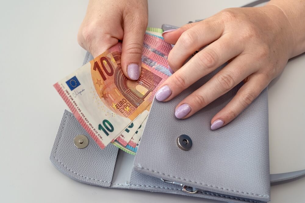 Euro notes in a wallet.