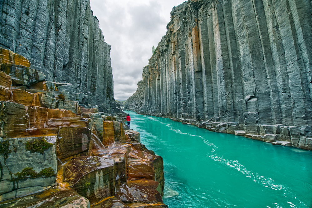 Stuðlagil Canyon. Basalt columns and green color river at Stuðlagil canyon.