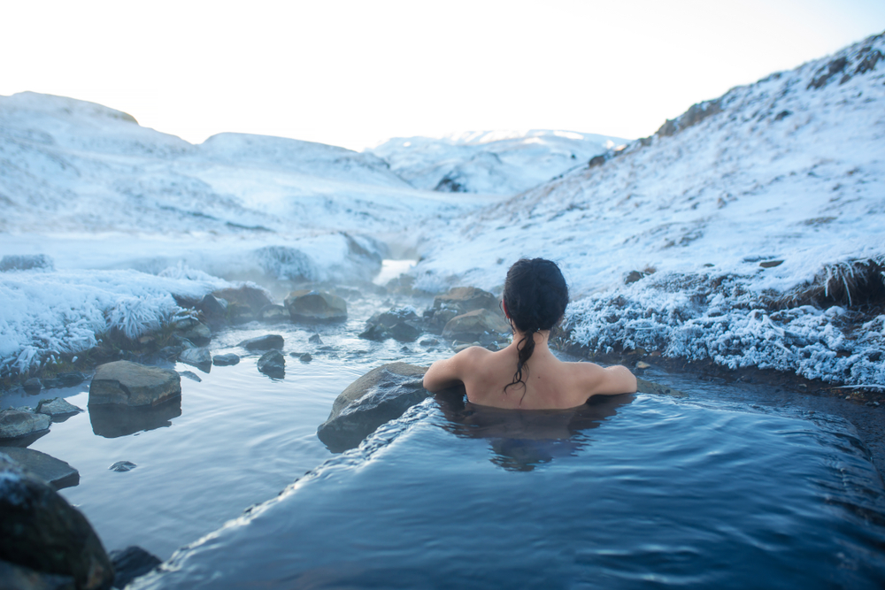Iceland hot spring march. Women in a hot spring in Iceland in march.