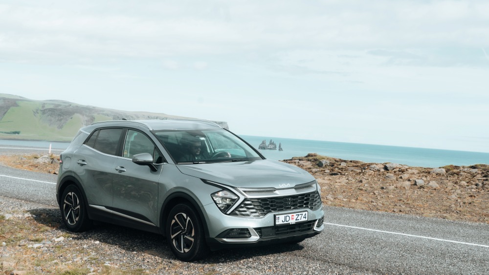 Kia Sportage rental car at Dyrhólaey south Iceland.
