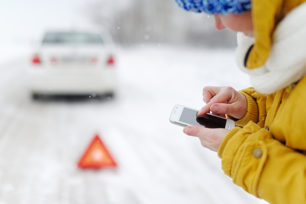 Women calling for assistance in the snow in Iceland. 