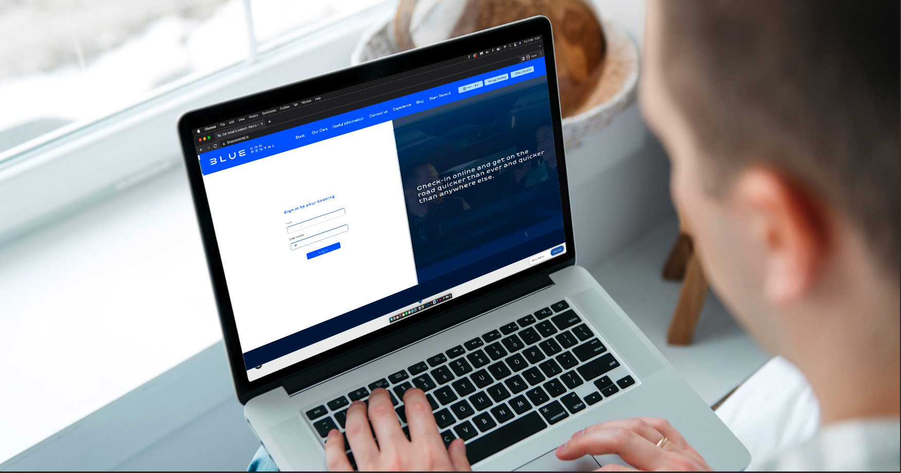 Computer screen with Blue Car rental info.