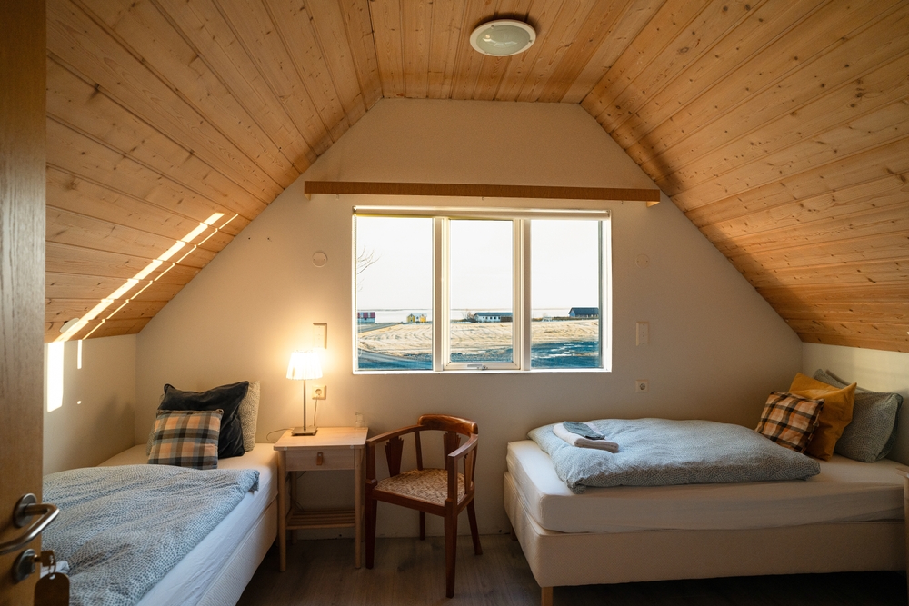 Bright hotel room in Iceland with two beds..