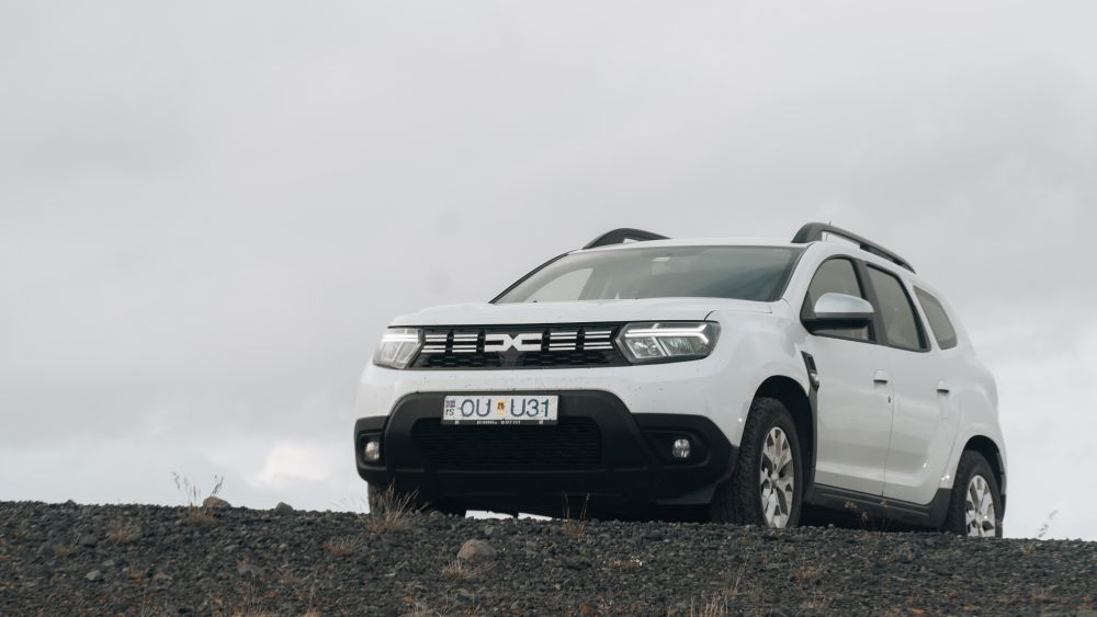 Duster Blue car rental. Dacia Duster 4x4 winter rental in Iceland